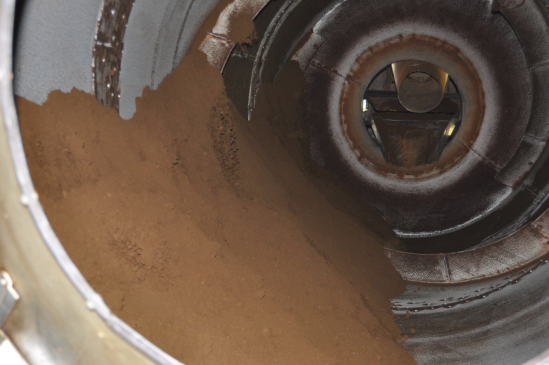 Fine tea particles inside an estate drying drum