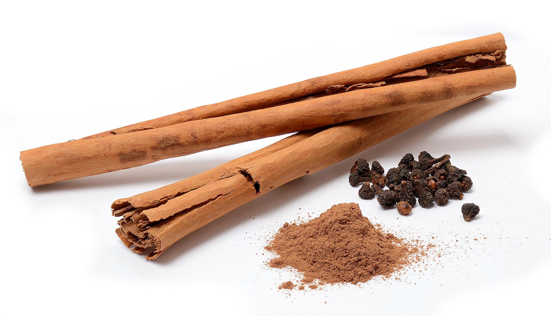 True Ceylon cinnamon quills beside ground cinnamon